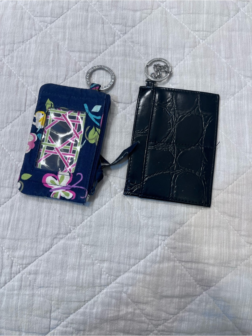 Vera BradleyNavy Floral Cardholder and a faux black one.